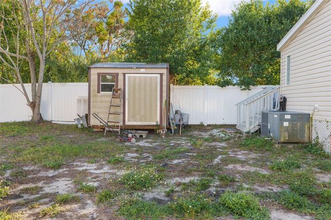 1118 Precision St, House other with 3 bedrooms, 2 bathrooms and null parking in Holiday FL | Image 24