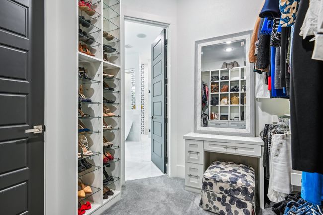Spacious closet featuring carpet | Image 21