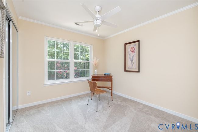 Carpeted office featuring crown molding and ceiling fan | Image 28
