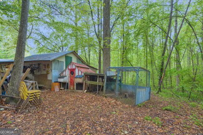 7616 Nicholson Rd, House other with 3 bedrooms, 2 bathrooms and 2 parking in cumming GA | Image 63