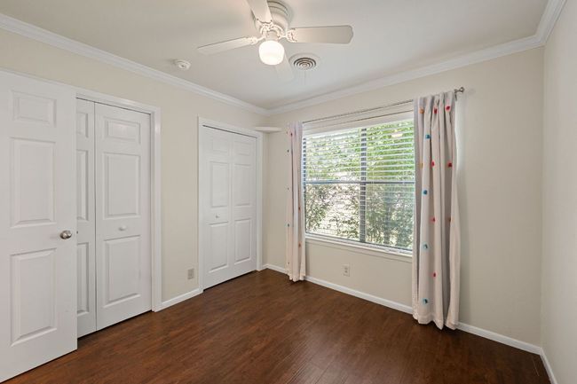 Dual closet system in the secondary bedroom | Image 22