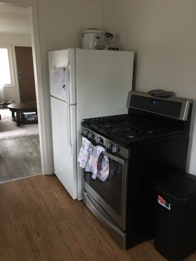 Stove and Fridge stay with home. | Image 7