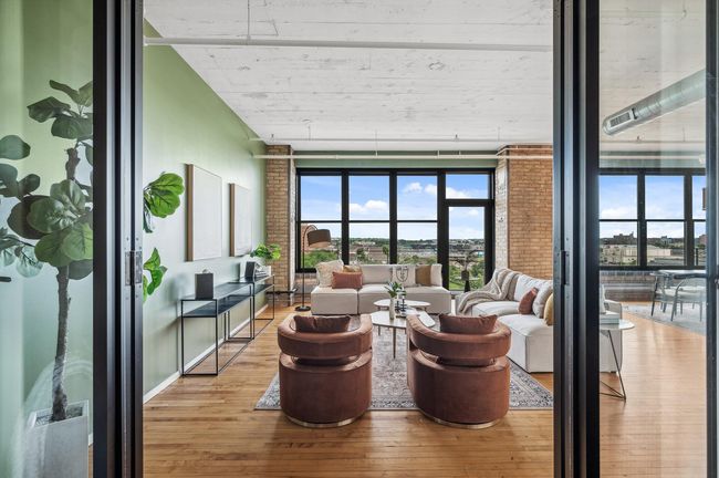 View from the bedroom into the living room through the glass doors | Image 26