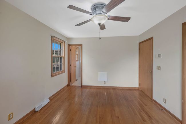 PRIMARY BR WITH TRIPLE DOOR CLOSET AND ACCESS TO HALF BA. CEILING FAN. | Image 21