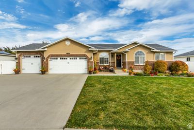 7497 S 4950 West W, House other with 6 bedrooms, 3 bathrooms and 10 parking in West Jordan UT | Image 1