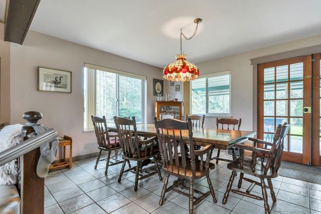 Dining area featuring baseboards and plenty of natural light | Image 12