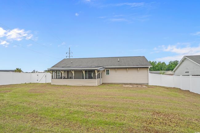Back of property featuring a sunroom | Image 26