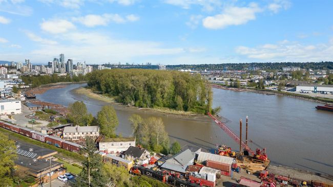 View of urban area featuring a nearby body of water | Image 5