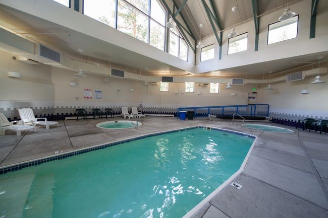 View of indoor pool | Image 26