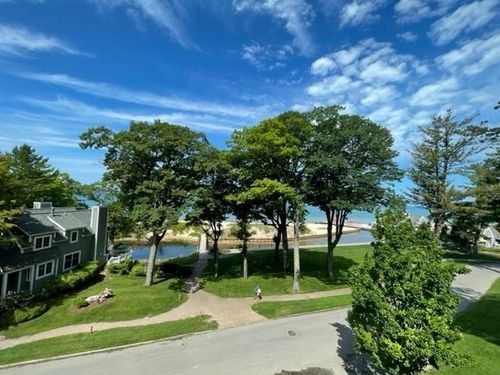 f-16F The Inn, Maple City, MI, 49664 | Card Image