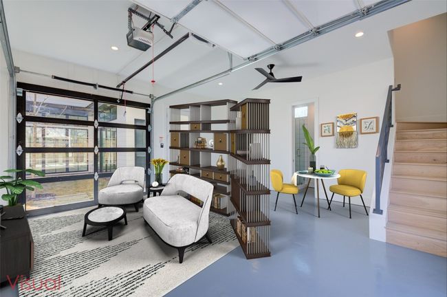 Virtually staged. Or, this could be the living/dining area for whoever is staying in the other flex space / potential bedroom above. | Image 31