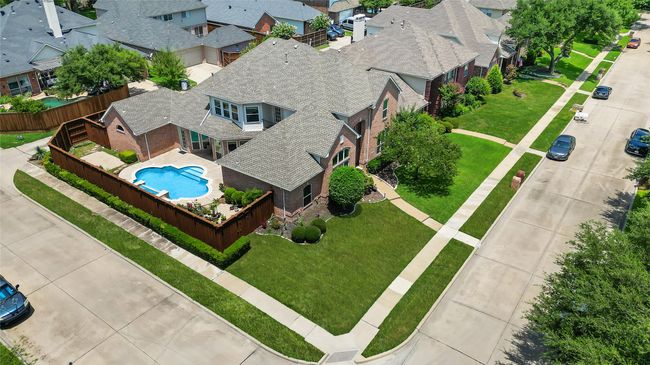 Aerial perspective of suburban area featuring a pool area | Image 33