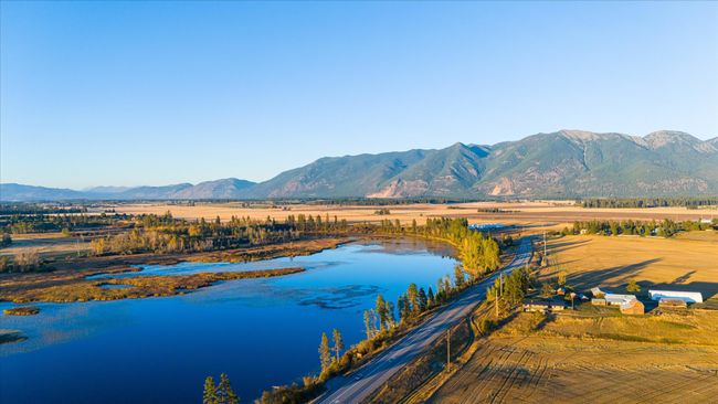 Property view of water with a mountain view and a rural view | Image 57
