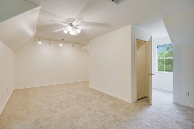 The upstairs flex room is perfect for a game room, media room, or creative space. | Image 23