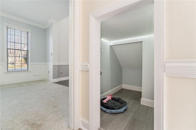 Charming nook could be a play space or doggie den | Image 22