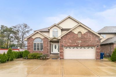 10826 S Ridgeland Avenue, House other with 4 bedrooms, 3 bathrooms and 2 parking in Worth IL | Image 1