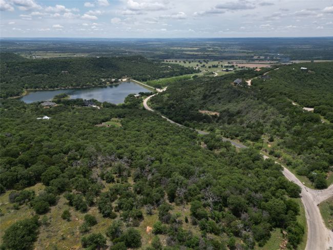 Aerial view featuring a water view and a view of trees | Image 19