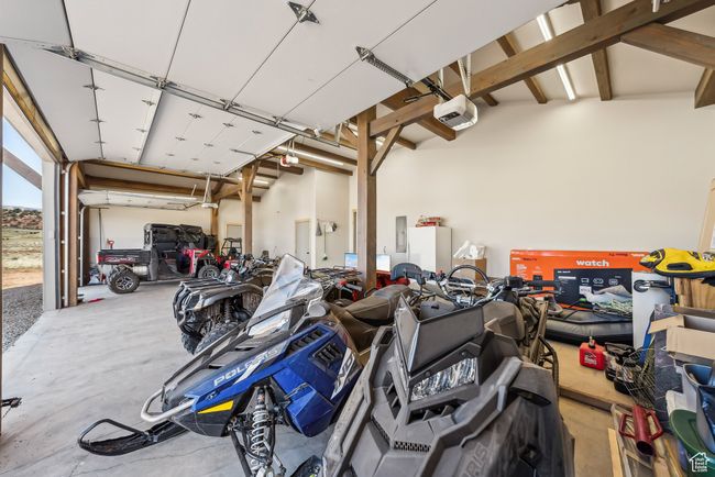 Garage with a garage door opener and electric panel | Image 21