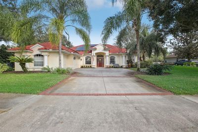 1230 Oxbridge Drive, House other with 4 bedrooms, 3 bathrooms and null parking in Lutz FL | Image 1