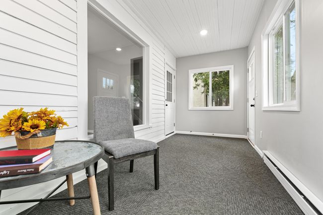 Another view of the charming front porch. | Image 23