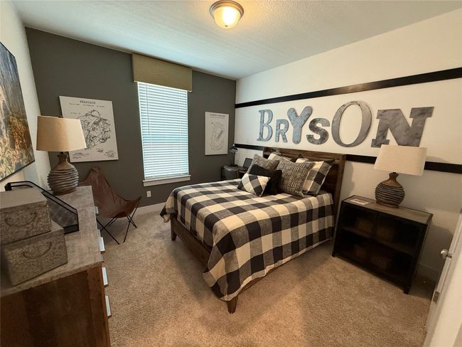 Bedroom featuring carpet floors | Image 8