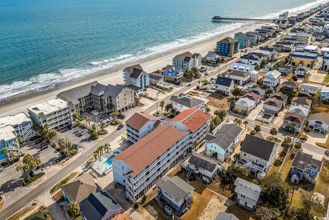 Aerial view featuring a water view and a view of the beach | Image 11