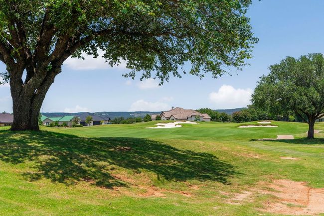 Home site backs to the 4th tee box of Barton Creek Lakeside. | Image 26
