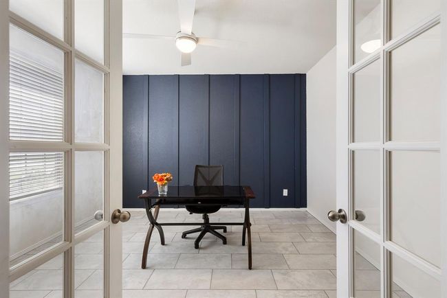 Spacious home office is located at the left as you enter the house. | Image 7