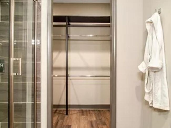 Bathroom with wood finished floors | Image 6