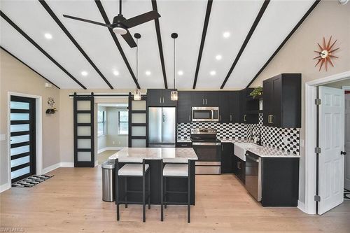 1922 Flamingo Dr, NORTH FORT MYERS, FL, 33917-3141 | Card Image