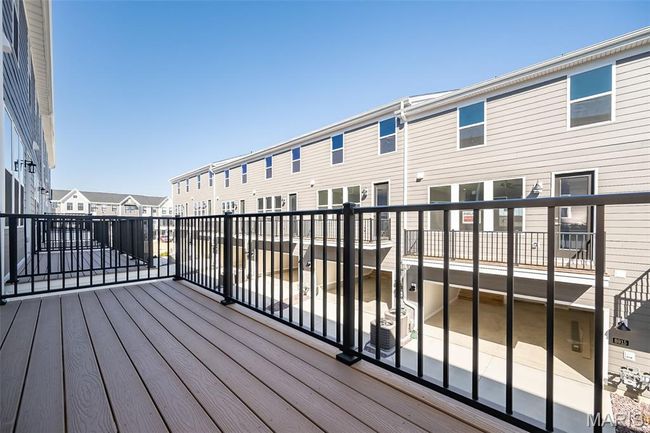 Wooden deck with a residential view | Image 37