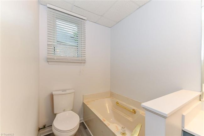 Basement bath also offers a tub | Image 36