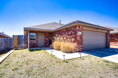 113th Street, Townhouse with 3 bedrooms, 2 bathrooms and null parking in Lubbock TX | Image 1