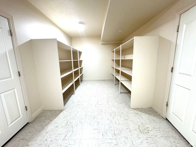 Storage area with built-in shelves | Image 31