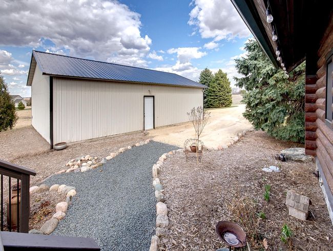 Walk way from the six car garage/shed | Image 7
