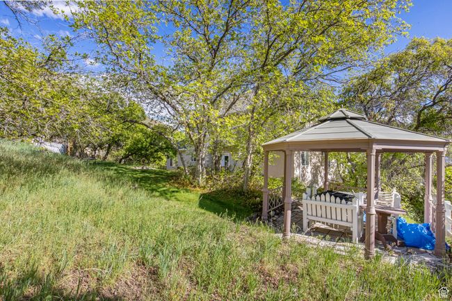 View of yard with a gazebo | Image 46