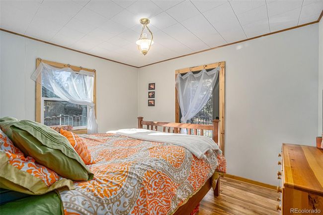 Great sized bedroom. Room to fit queen bed, and multiple furniture items. Private entrance to deck | Image 10