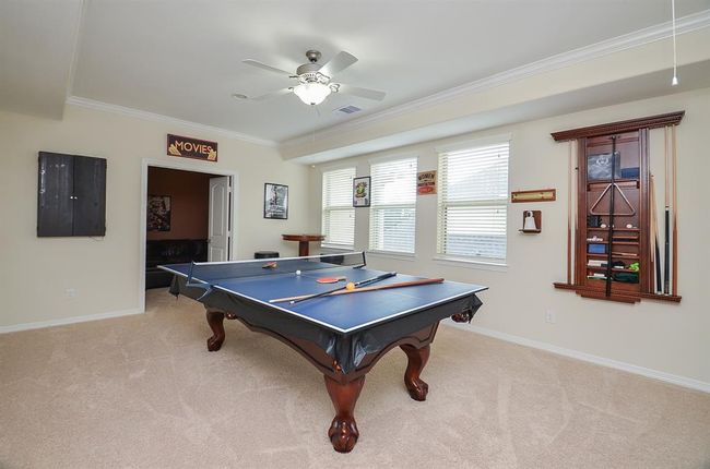 Large game room. Table can stay. | Image 34