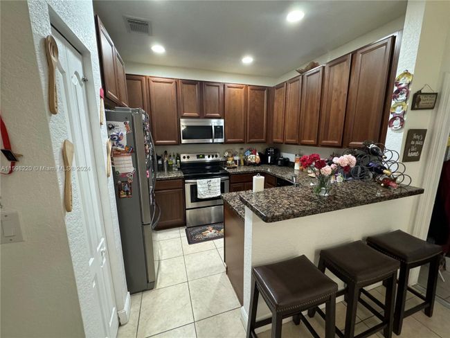 14263 Sw 272nd Ln, Townhouse with 2 bedrooms, 2 bathrooms and null parking in Homestead FL | Image 10