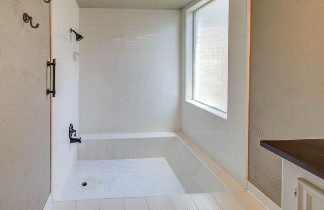 Large shower and sunken tub. | Image 27