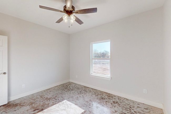 Empty room with baseboards and a ceiling fan | Image 34