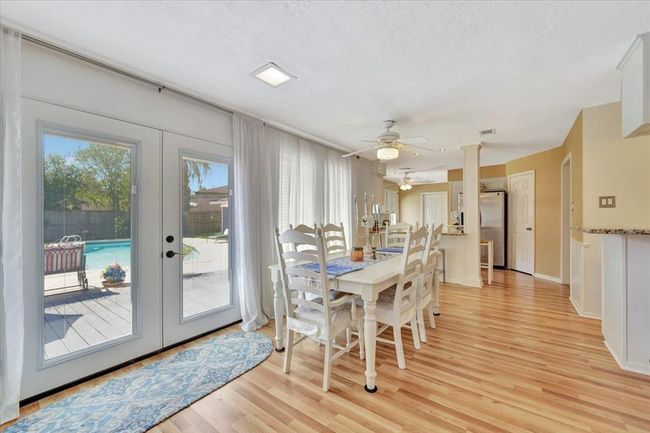 The double back doors have recently been replaced and offer beautiful views of the pool and backyard space. | Image 13
