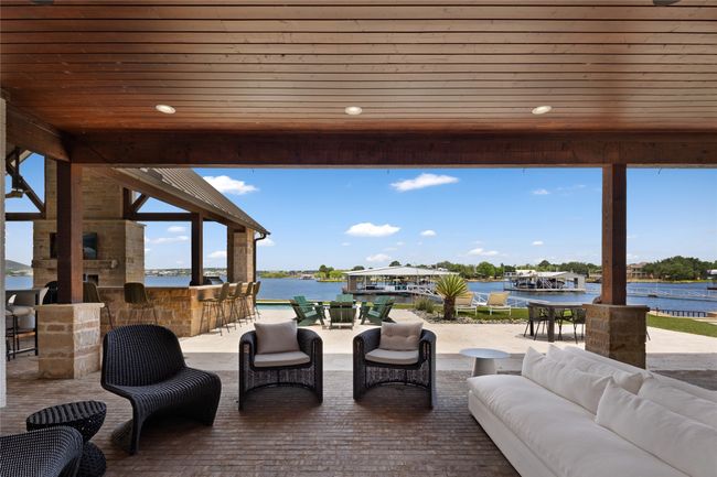 View of patio with a water view, an outdoor pool, and a gazebo | Image 34