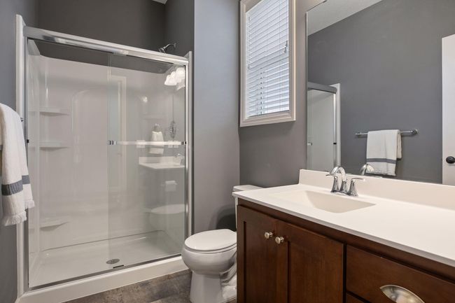 Main floor 3/4 bath is one of 5 bathrooms throughout the home. | Image 6