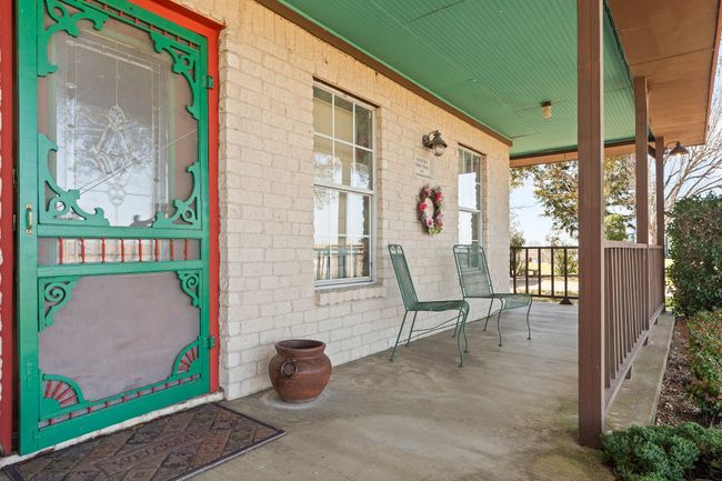 Covered front wraparound porch | Image 8