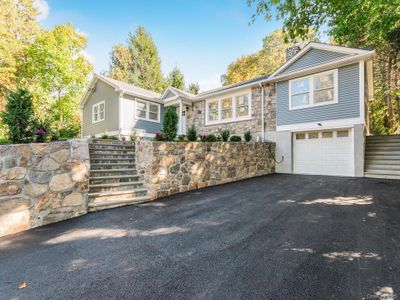 View of front of property with a garage | Image 3