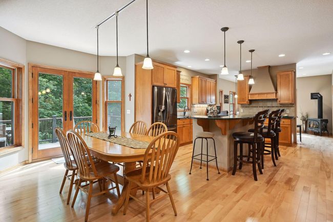 Natural light pours into the kitchen and dining area. | Image 5