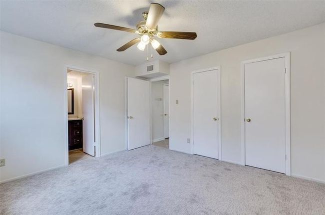Expansive bedroom featuring a generous walk-in closet. | Image 17
