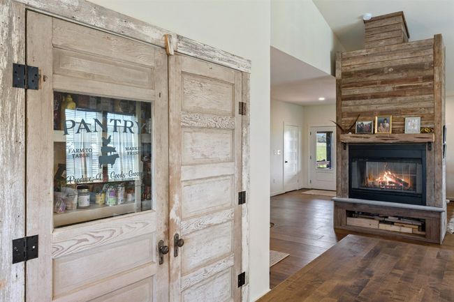 Pantry in Kitchen with vintage doors. | Image 6