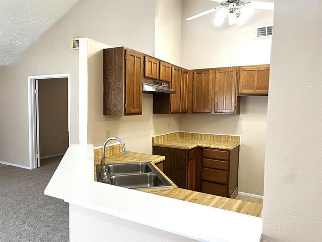 This breakfast bar can also double as a serving area when you entertain! | Image 8